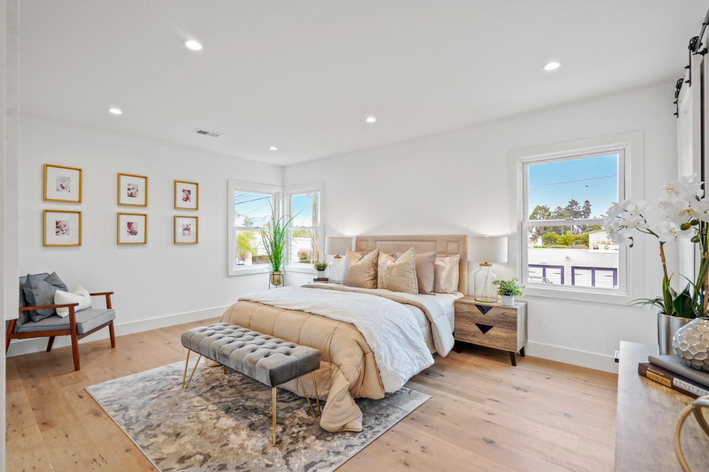 201 Channing Road Burlingame, CA 94010 - Photo 22 of 52 a bedroom with a bed furniture and paintings on wall