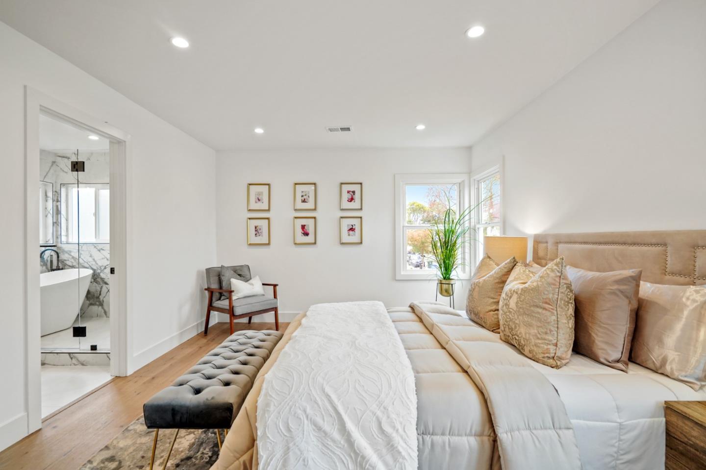 201 Channing Road Burlingame, CA 94010 - Photo 24 of 52 a bedroom with a bed and a couch