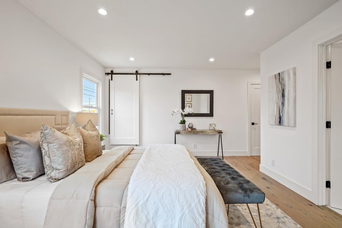 201 Channing Road Burlingame, CA 94010 - Photo 25 of 52 a bedroom with a bed and a flat screen tv