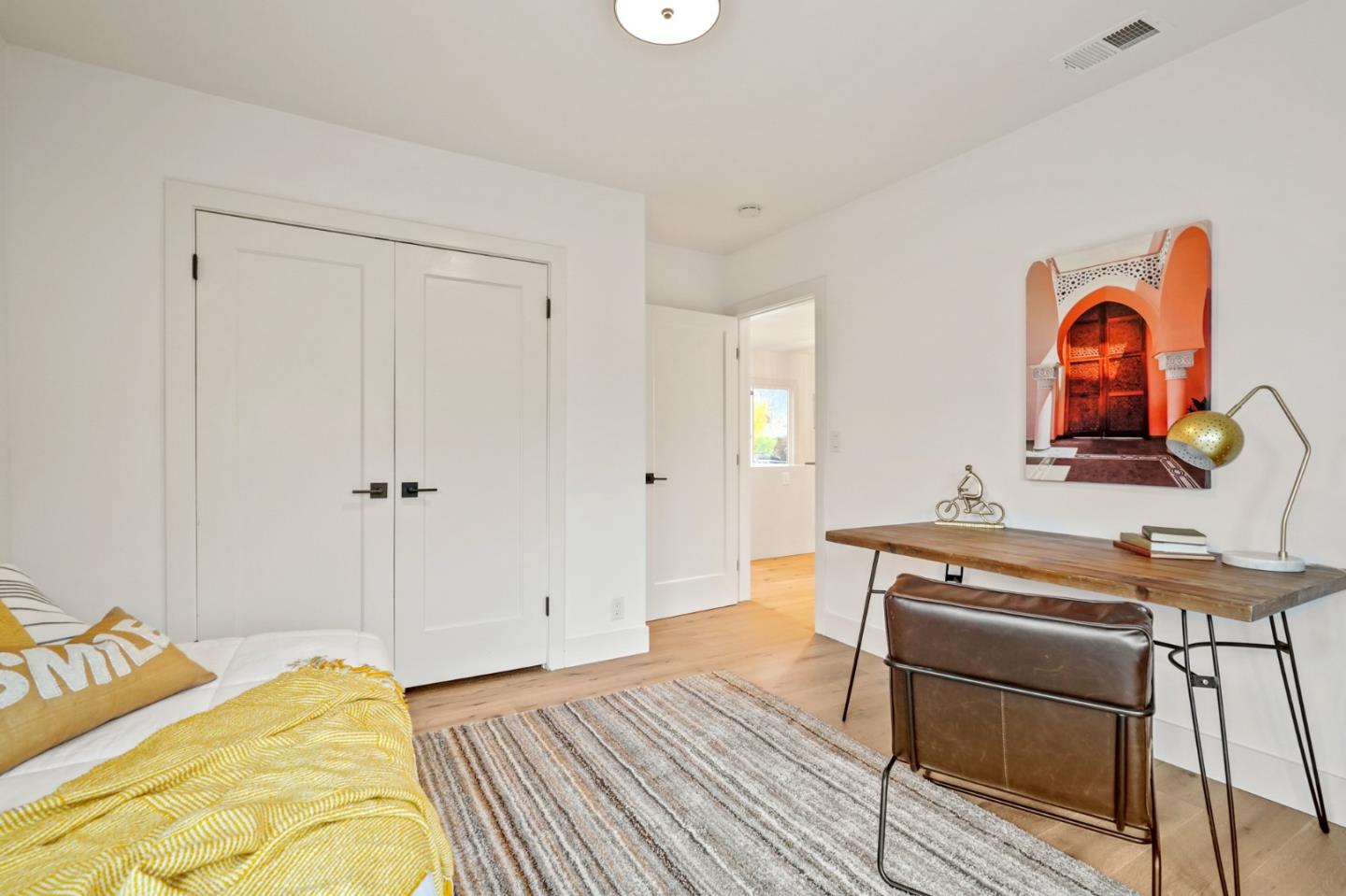 201 Channing Road Burlingame, CA 94010 - Photo 34 of 52 a bedroom with a bed and a dresser