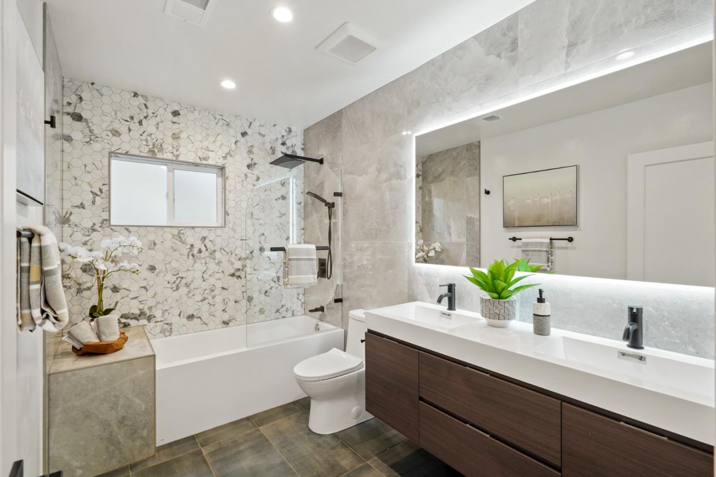 201 Channing Road Burlingame, CA 94010 - Photo 35 of 52 a bathroom with a bathtub shower sink and toilet