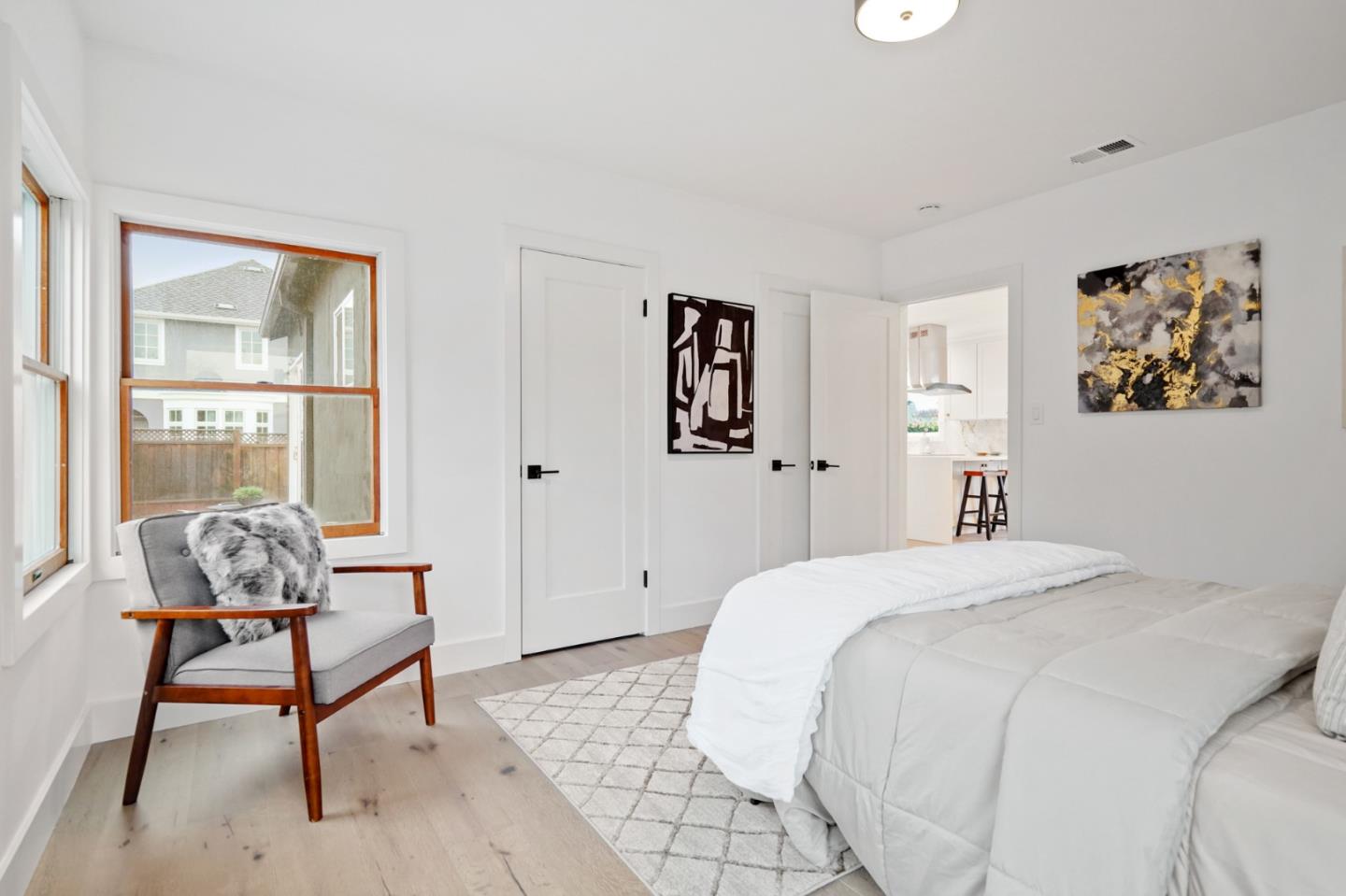 201 Channing Road Burlingame, CA 94010 - Photo 41 of 52 a bedroom with a bed and a window