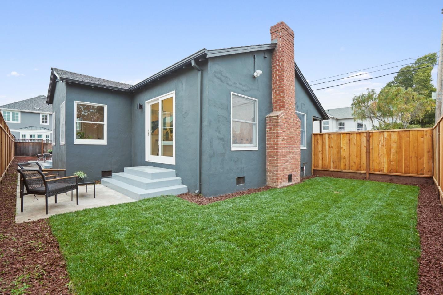 201 Channing Road Burlingame, CA 94010 - Photo 44 of 52 a view of a house with backyard and a garden