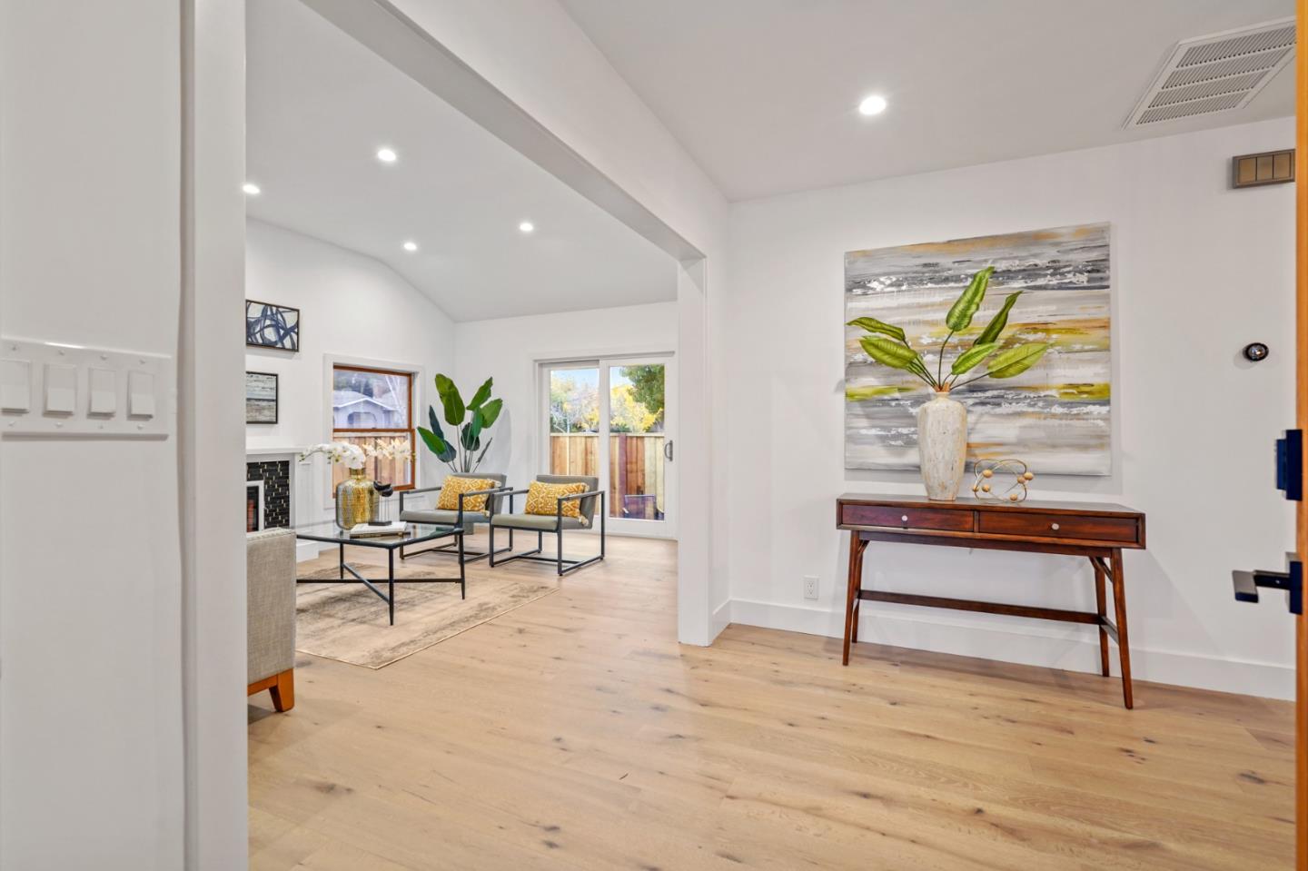201 Channing Road Burlingame, CA 94010 - Photo 6 of 52 a living room with furniture and a wooden floor