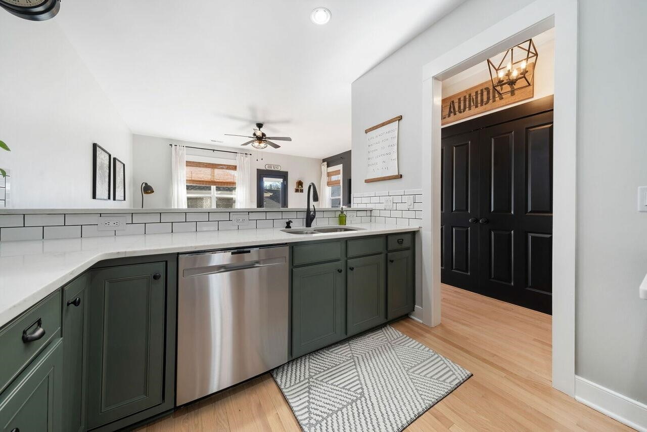 4417 All Points View Way Raleigh, NC 27614 - Photo 15 of 34 a kitchen with a sink and a refrigerator