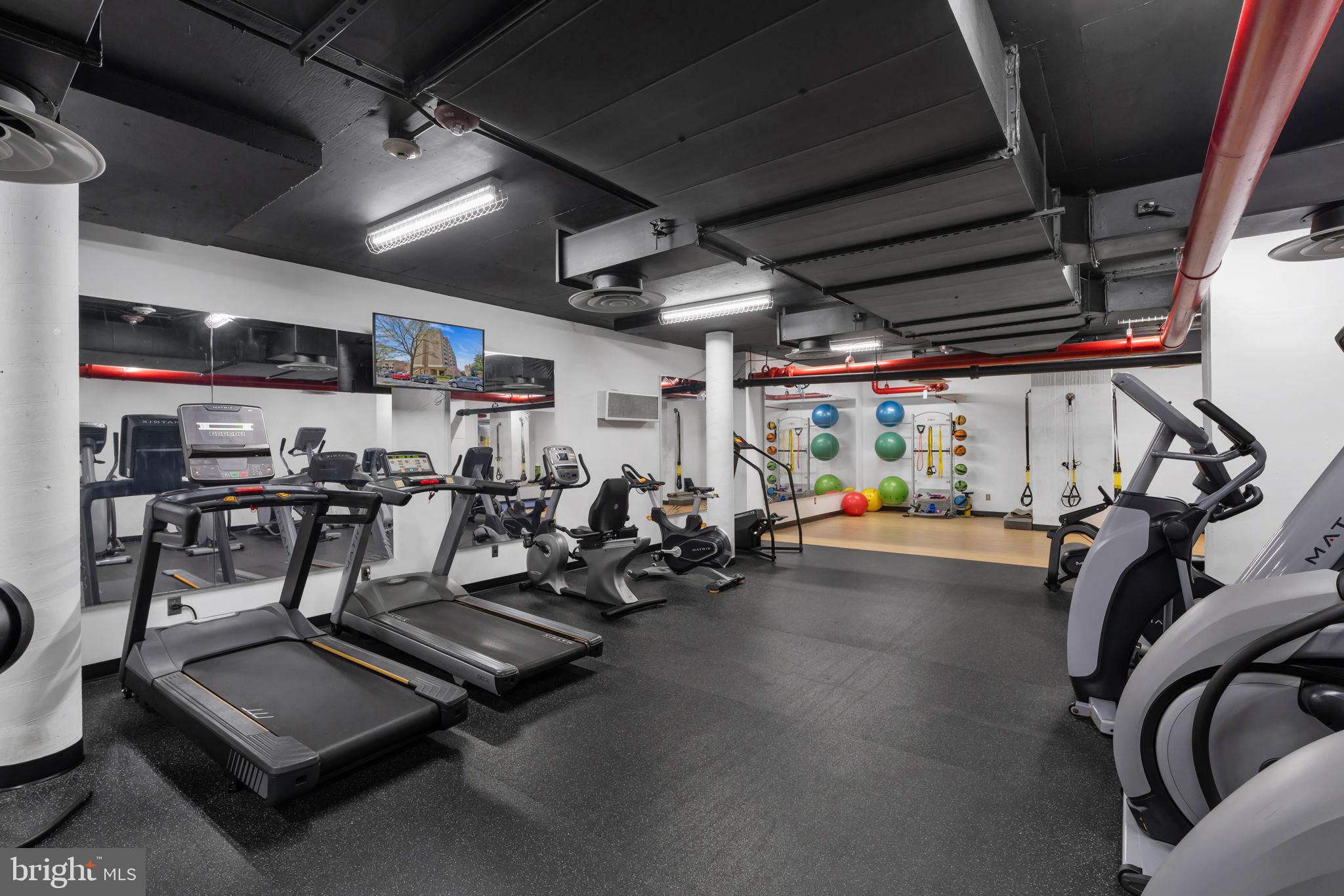 1245 4th Street Southwest, Unit E210 Washington, DC 20024 - Photo 23 of 28 a view of a room with gym equipment
