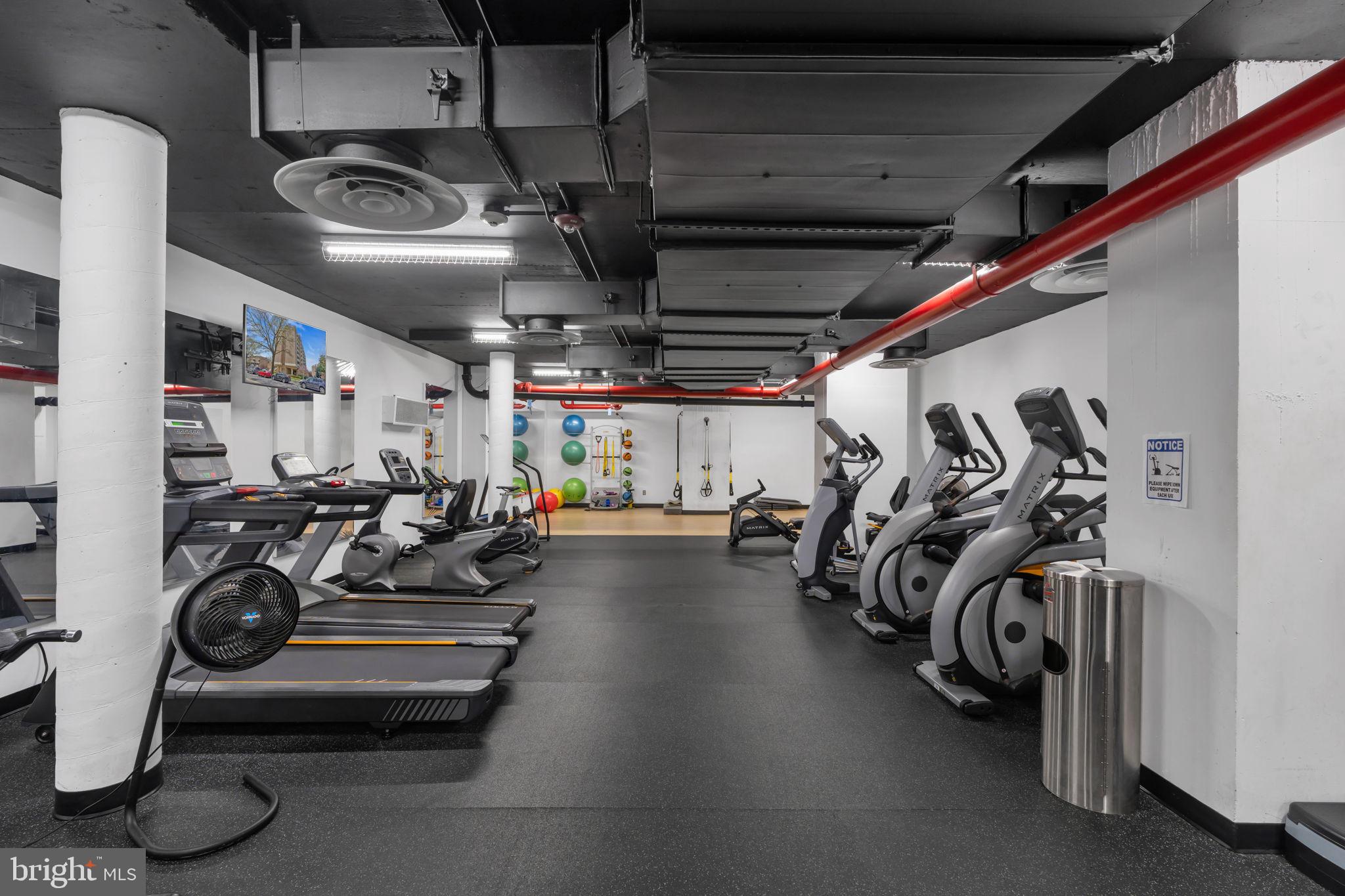 1245 4th Street Southwest, Unit E210 Washington, DC 20024 - Photo 24 of 28 a view of a room with gym equipment