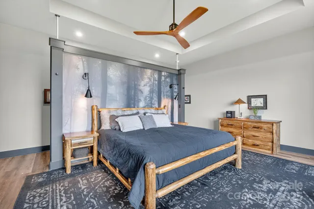 a bed room with a bed and a table