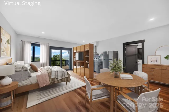 a living room with furniture and a table