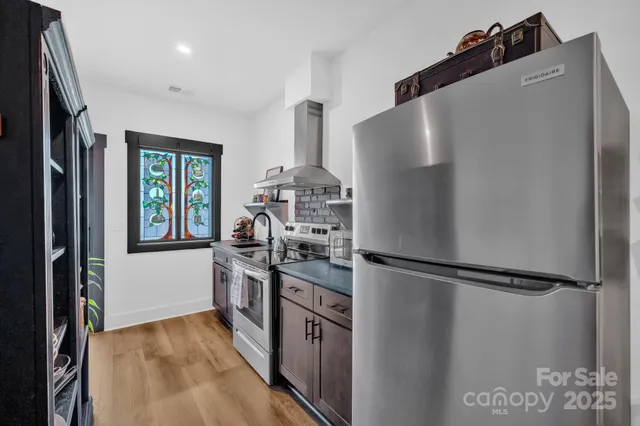 a living room with furniture gym equipment and a view of living room