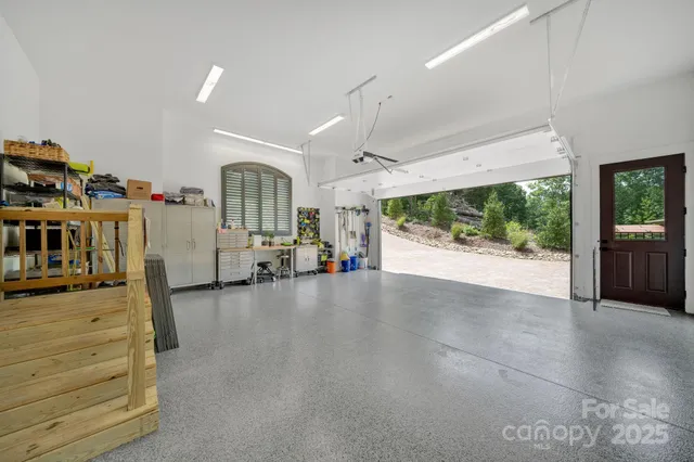 view of a city with lush green forest