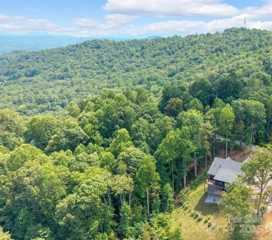 a view of a green yard from a balcony