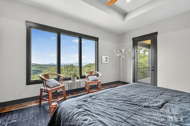 a bed room with a bed and a table