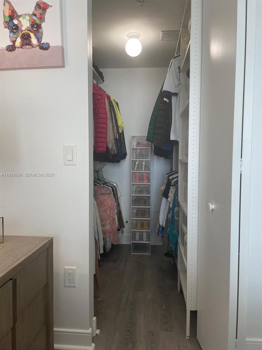 185 Southwest 7th Street, Unit 2014 Miami, FL 33130 - Photo 11 of 38 a view of walk in closet