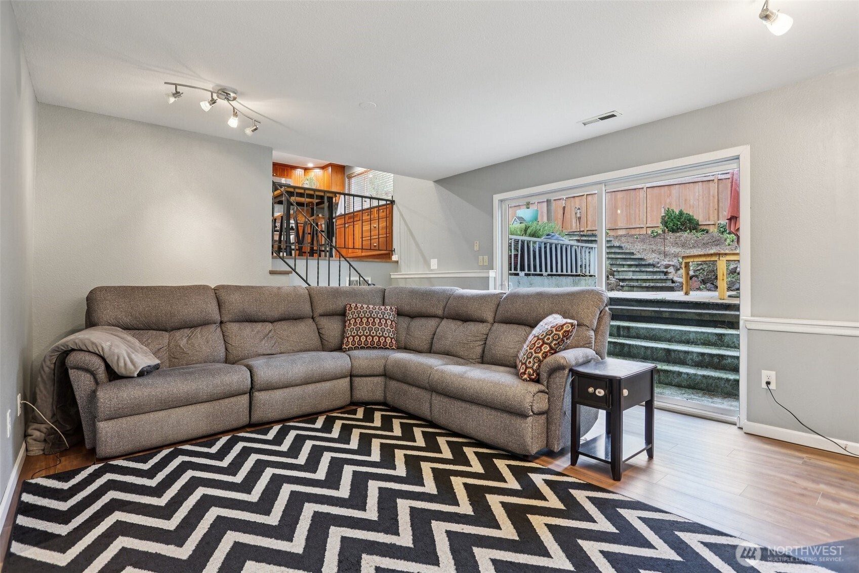 2611 178th Street Southeast Bothell, WA 98012 - Photo 11 of 27 a living room with furniture a rug and a window