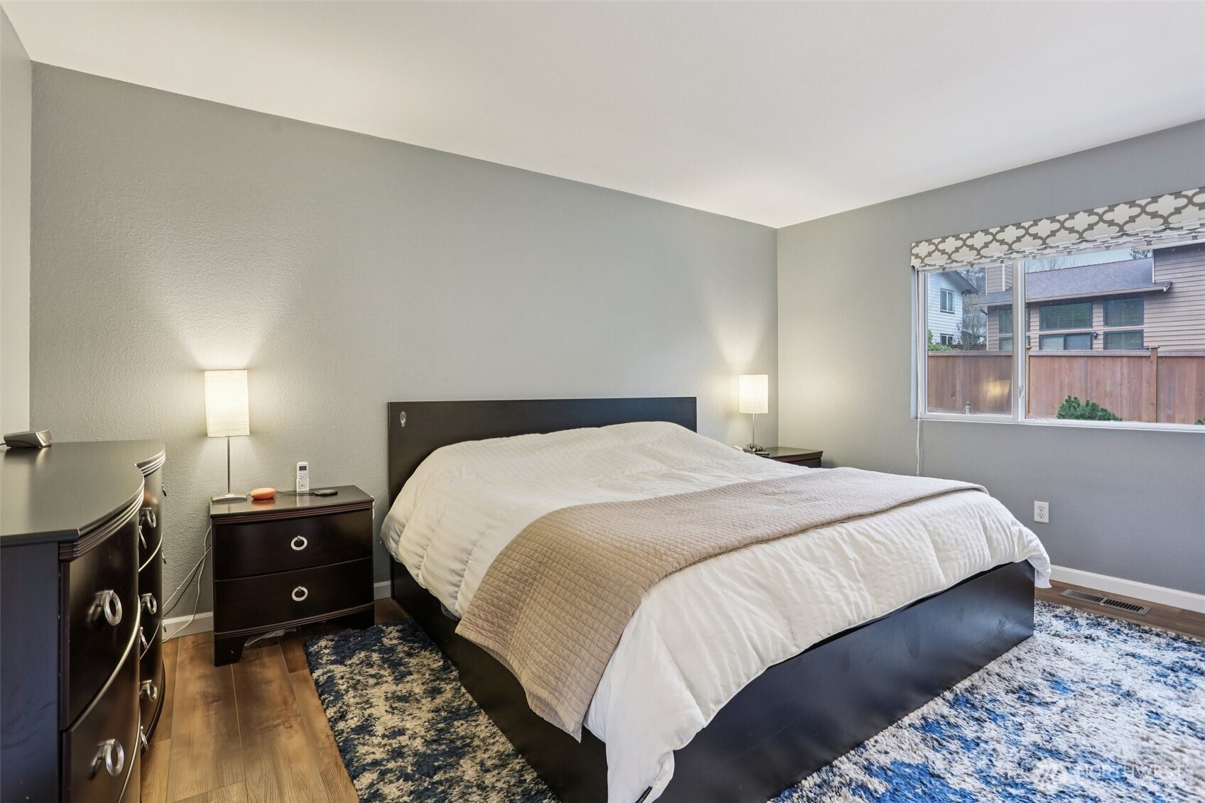 2611 178th Street Southeast Bothell, WA 98012 - Photo 14 of 27 a bedroom with a bed and a night stand