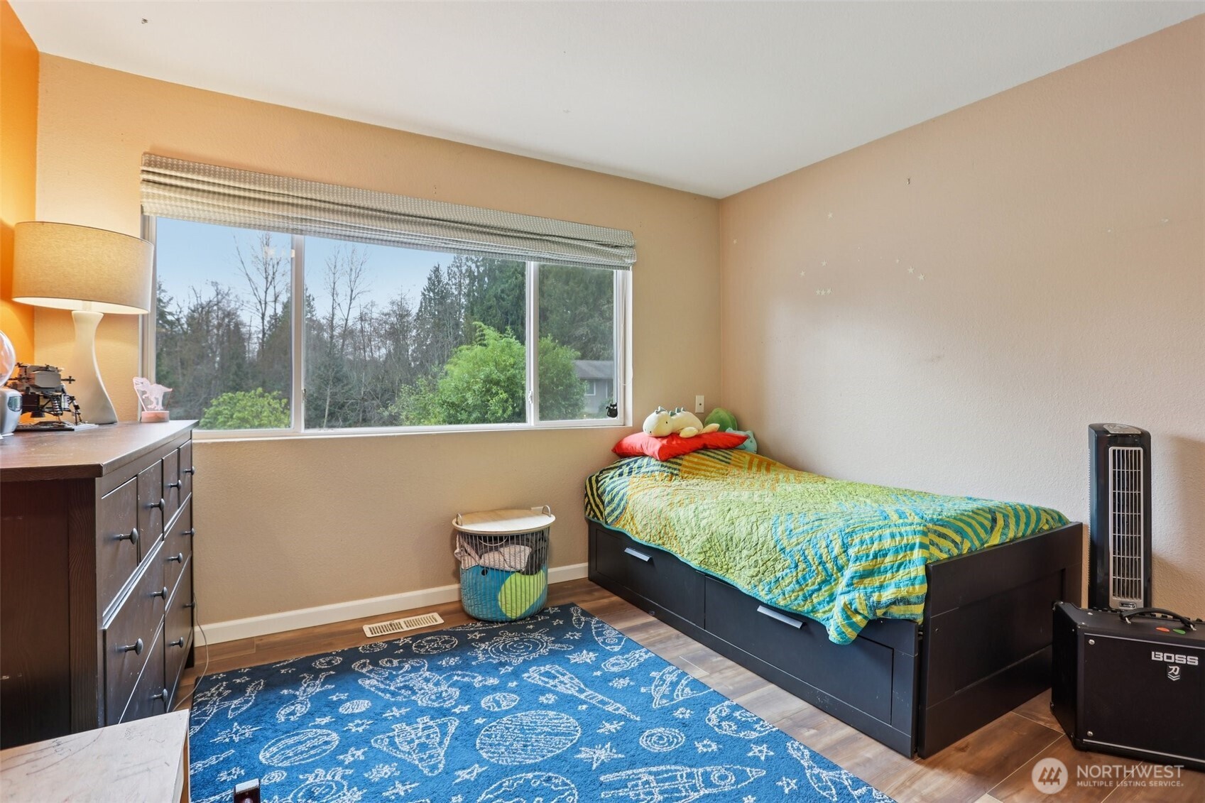 2611 178th Street Southeast Bothell, WA 98012 - Photo 18 of 27 a bed room with a bed and a window