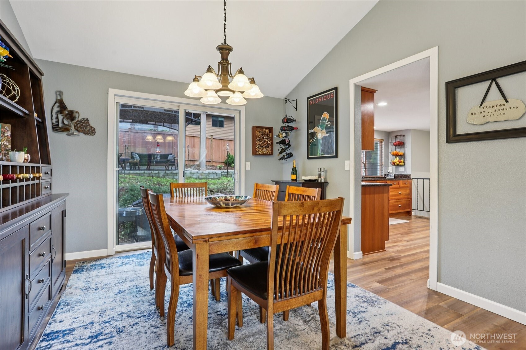 2611 178th Street Southeast Bothell, WA 98012 - Photo 6 of 27 a view of a dining room with furniture wooden floor and chandelier