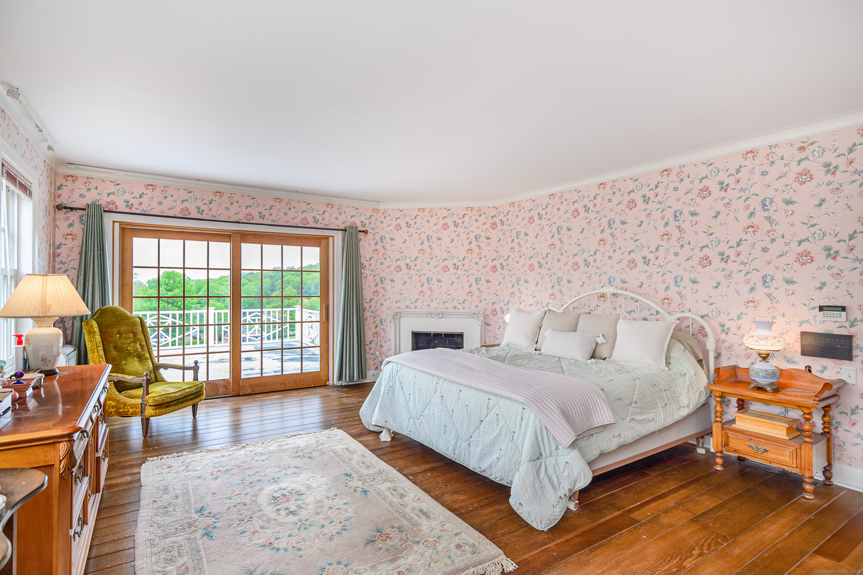 49 Great Ring Road Newtown, CT 06482 - Photo 12 of 40 Primary bedroom with en suite bath, fireplace, and access to your very own private rooftop terrace