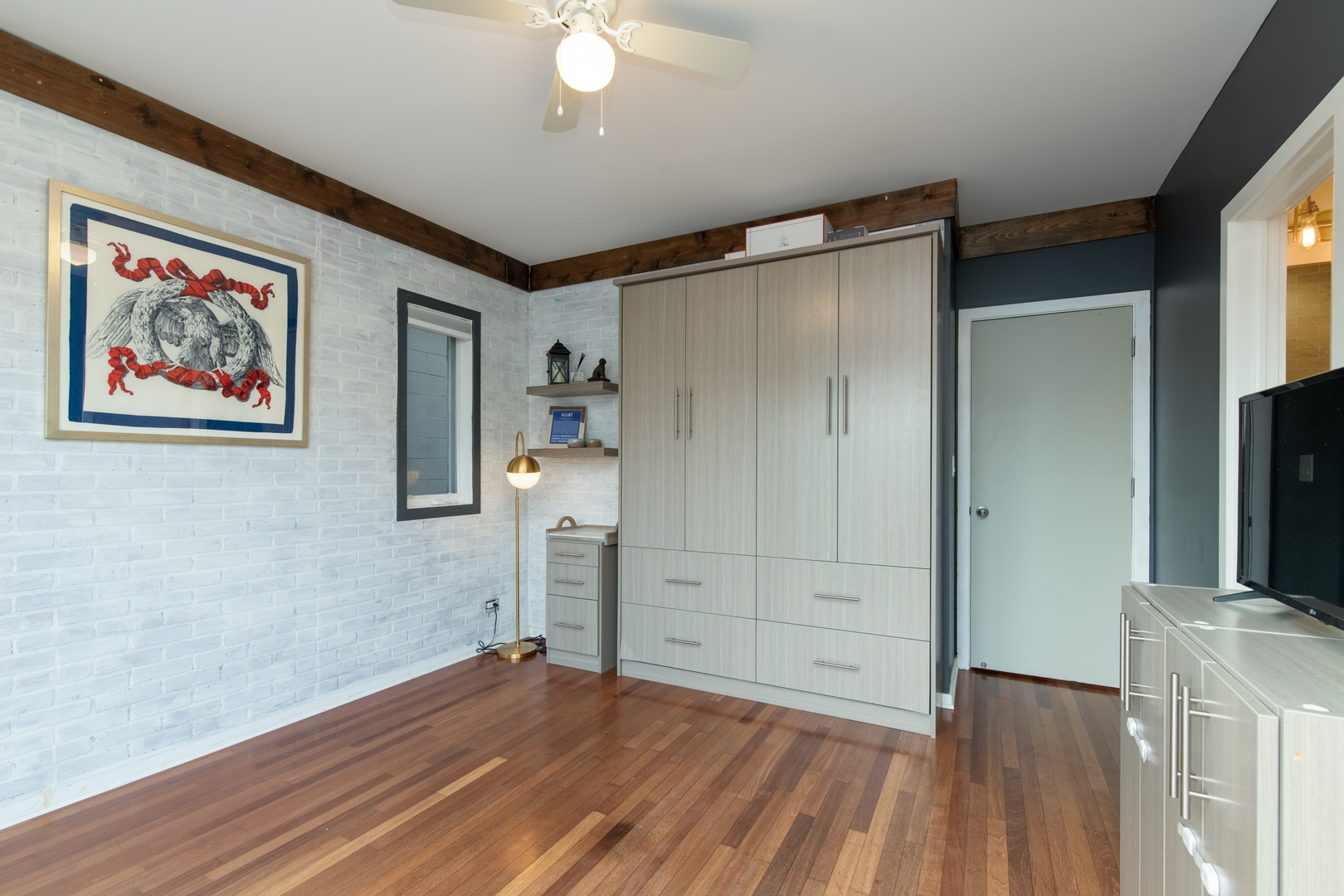 1409 West Huron Street, Unit 3 Chicago, IL 60642 - Photo 25 of 42 a view of empty room with wooden floor