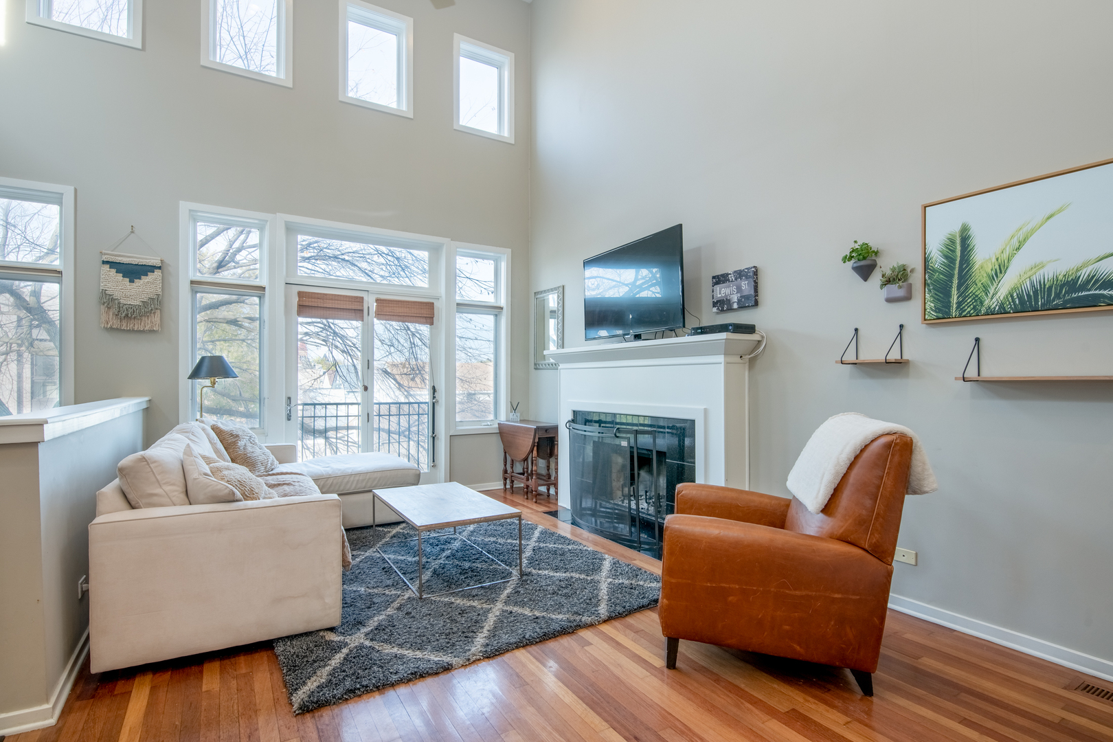 1409 West Huron Street, Unit 3 Chicago, IL 60642 - Photo 4 of 42 a living room with furniture and a fireplace