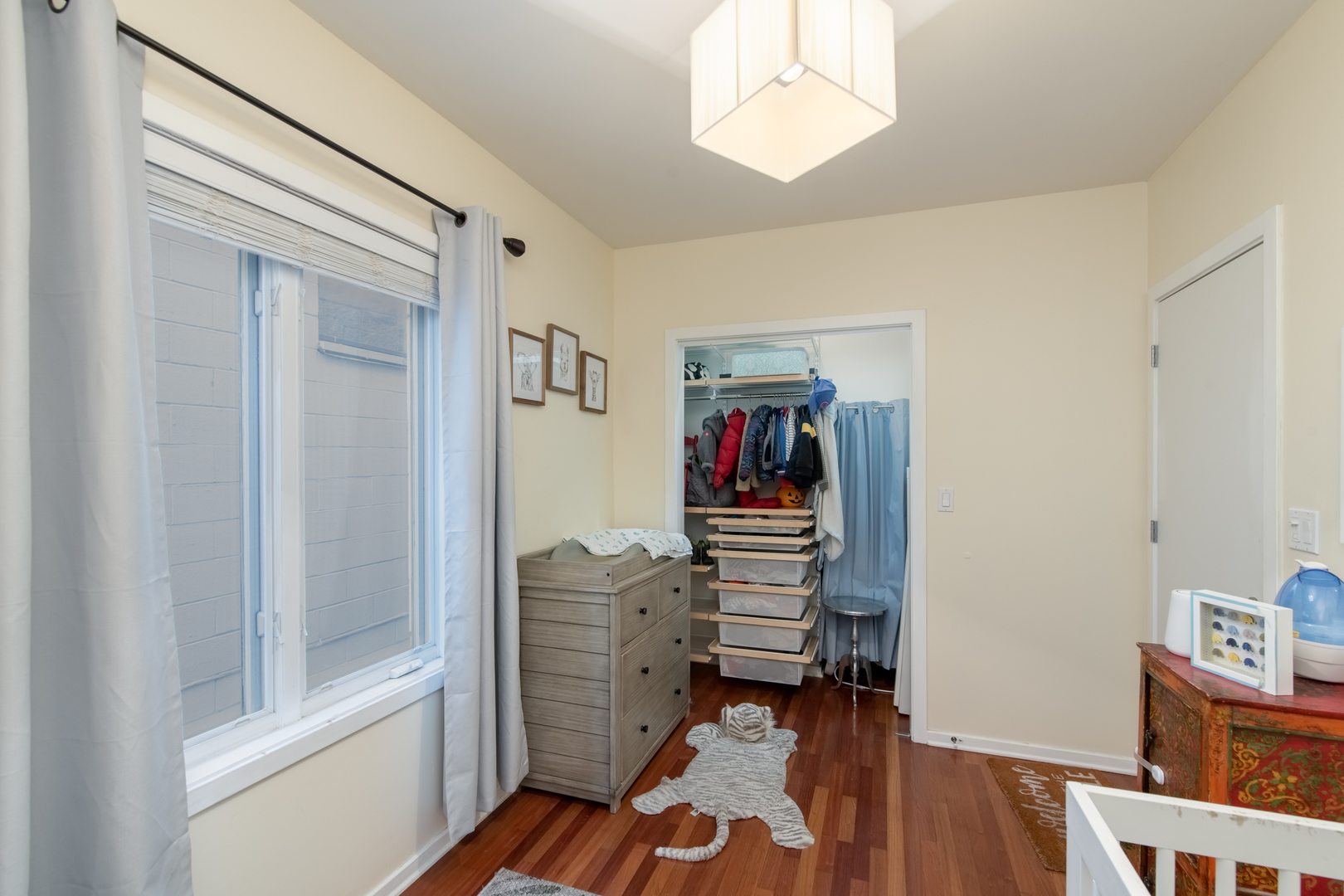 1409 West Huron Street, Unit 3 Chicago, IL 60642 - Photo 34 of 42 a view of room with furniture and wooden floor