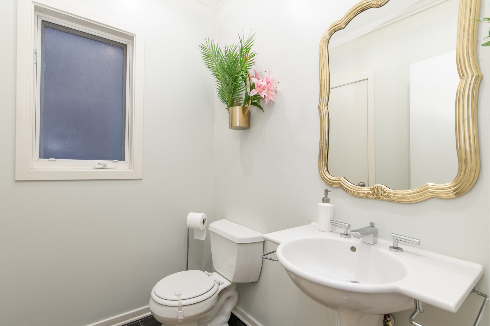 1409 West Huron Street, Unit 3 Chicago, IL 60642 - Photo 35 of 42 a bathroom with a sink toilet and mirror