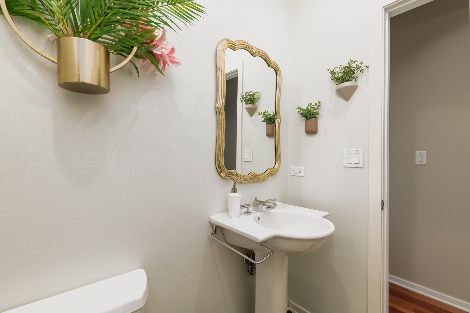 1409 West Huron Street, Unit 3 Chicago, IL 60642 - Photo 36 of 42 a bathroom with a sink toilet and mirror