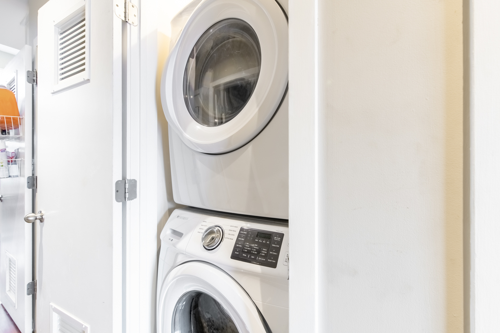 1409 West Huron Street, Unit 3 Chicago, IL 60642 - Photo 37 of 42 a close up view of a washer and dryer
