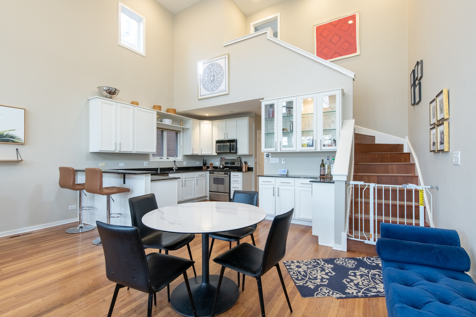 1409 West Huron Street, Unit 3 Chicago, IL 60642 - Photo 10 of 42 a dining room with furniture and wooden floor