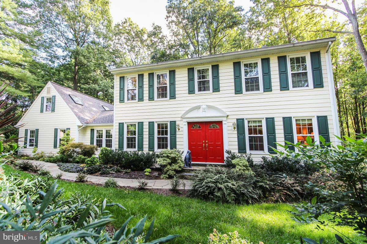 Classic Colonial elegance with side load garage