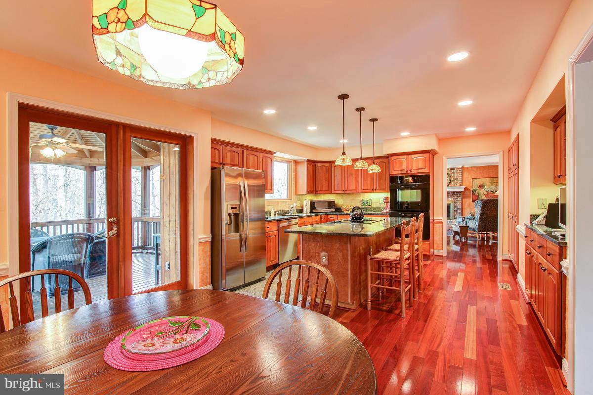 10901 Wilder Point Lane Reston, VA 20191 - Photo 13 of 30 Kitchen opens to Screened Porch