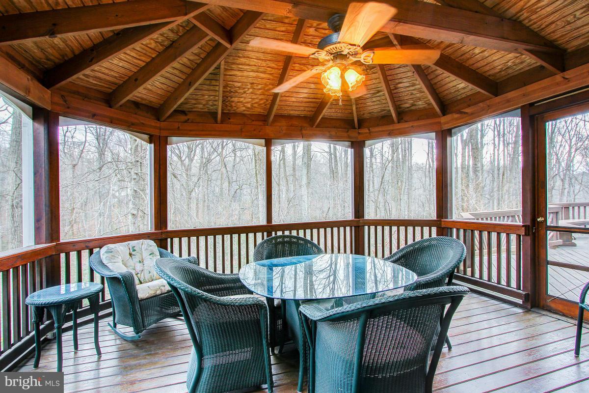 10901 Wilder Point Lane Reston, VA 20191 - Photo 14 of 30 Screened Porch overlooks acres of parkland