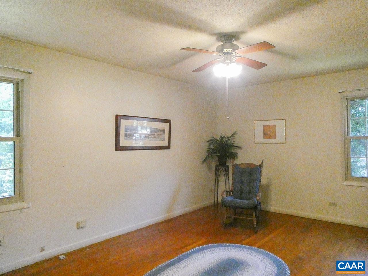 106 Elkhorn Road Charlottesville, VA 22903 - Photo 12 of 27 a workspace with furniture and window