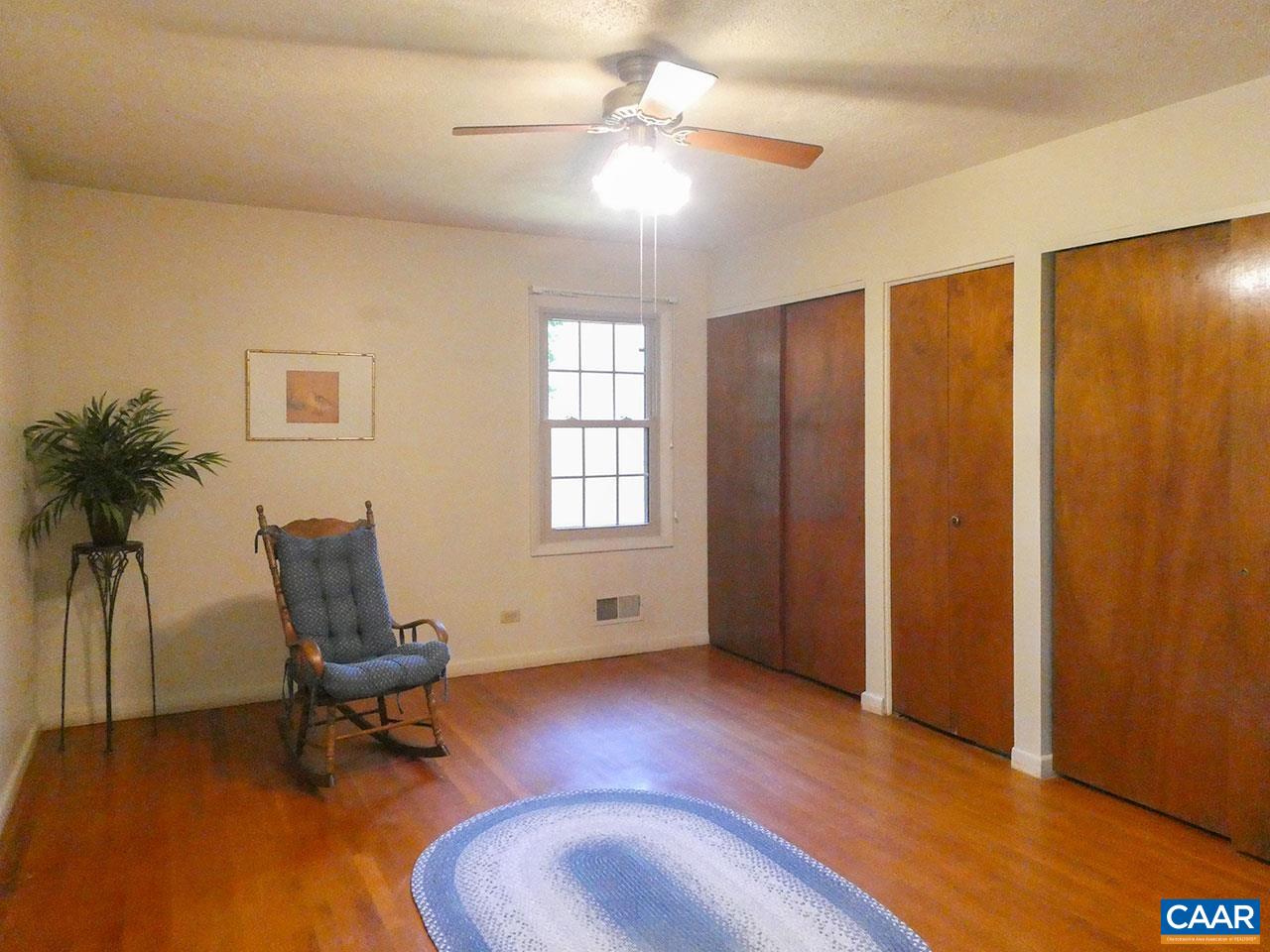 106 Elkhorn Road Charlottesville, VA 22903 - Photo 14 of 27 a living room with furniture and a window