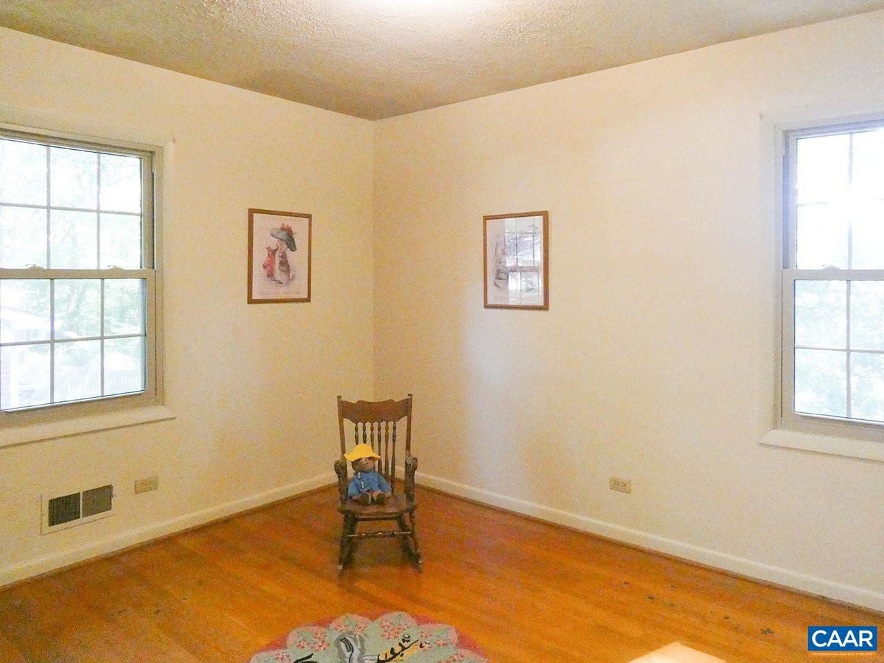 106 Elkhorn Road Charlottesville, VA 22903 - Photo 16 of 27 a view of a workspace with furniture and a window