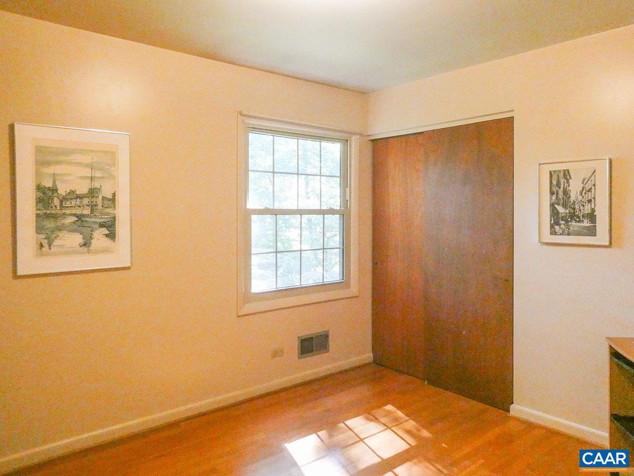106 Elkhorn Road Charlottesville, VA 22903 - Photo 17 of 27 a view of an empty room with a window