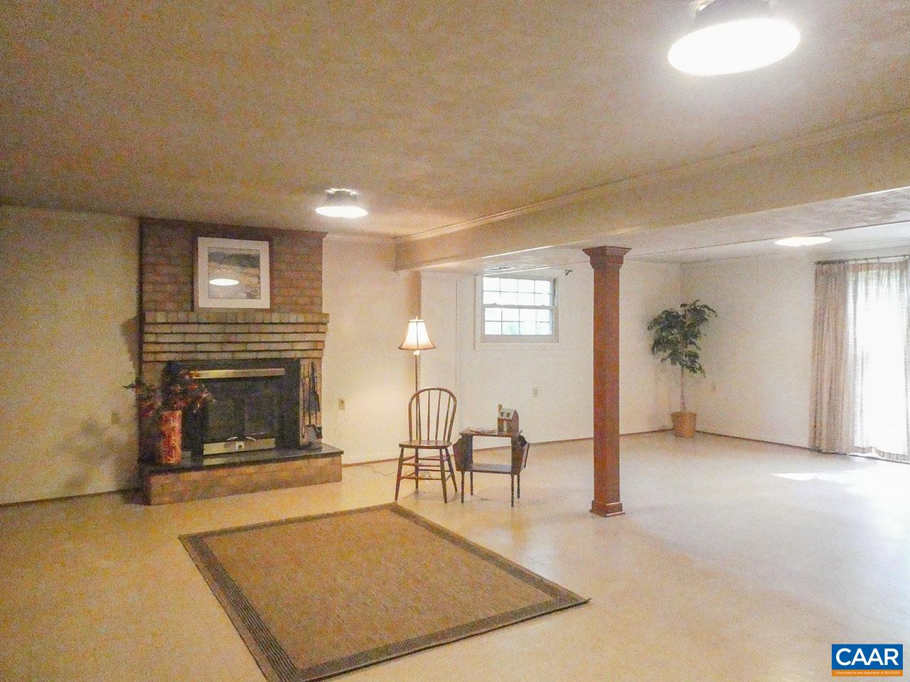 106 Elkhorn Road Charlottesville, VA 22903 - Photo 19 of 27 a view of livingroom with furniture and fireplace