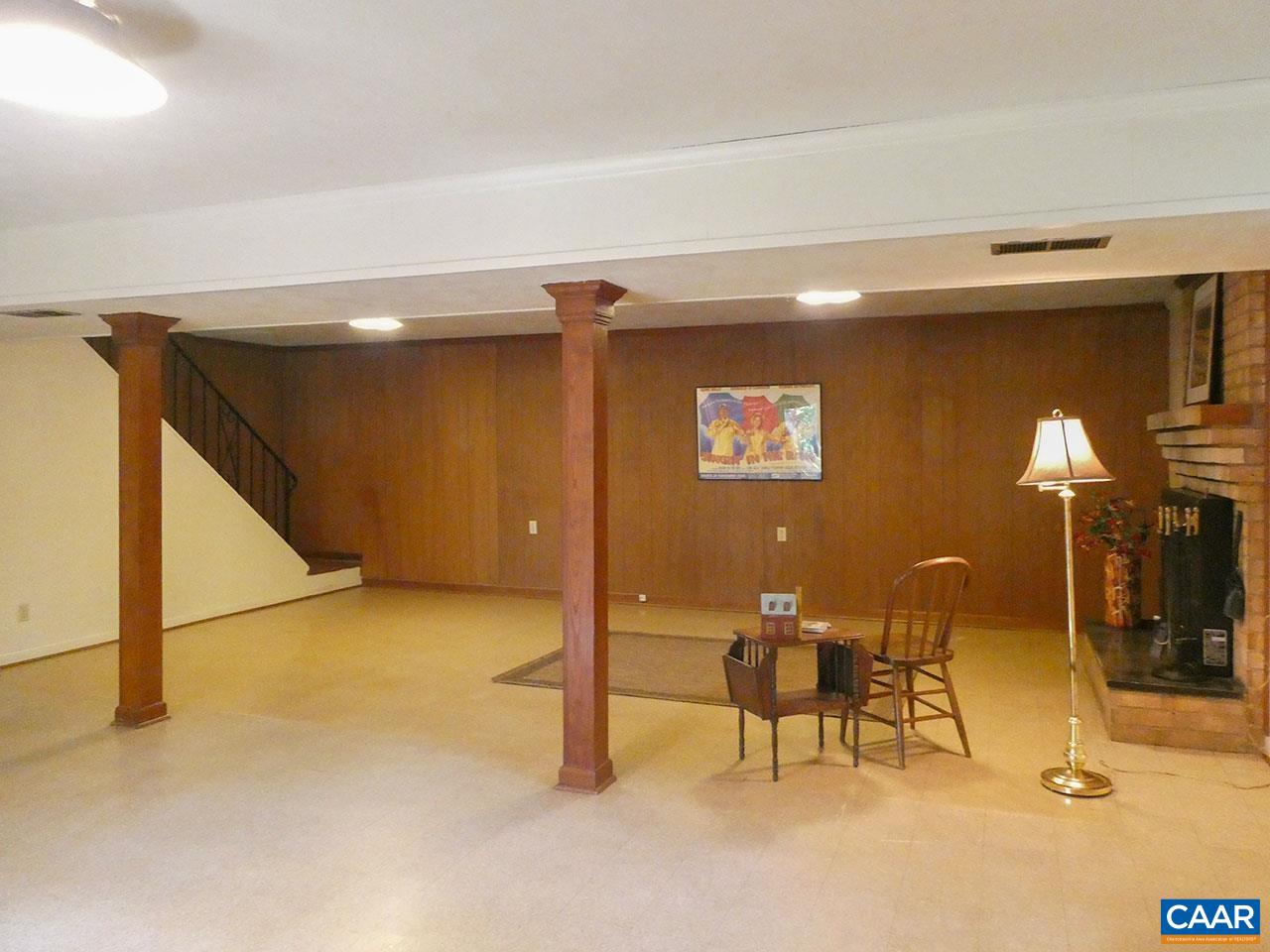 106 Elkhorn Road Charlottesville, VA 22903 - Photo 21 of 27 a view of an empty room with chandelier fan
