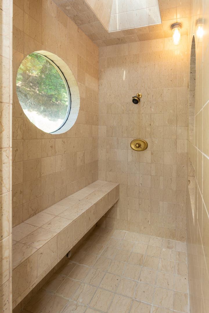 343 Beach Drive Aptos, CA 95003 - Photo 18 of 34 a bathroom with a tub and a shower