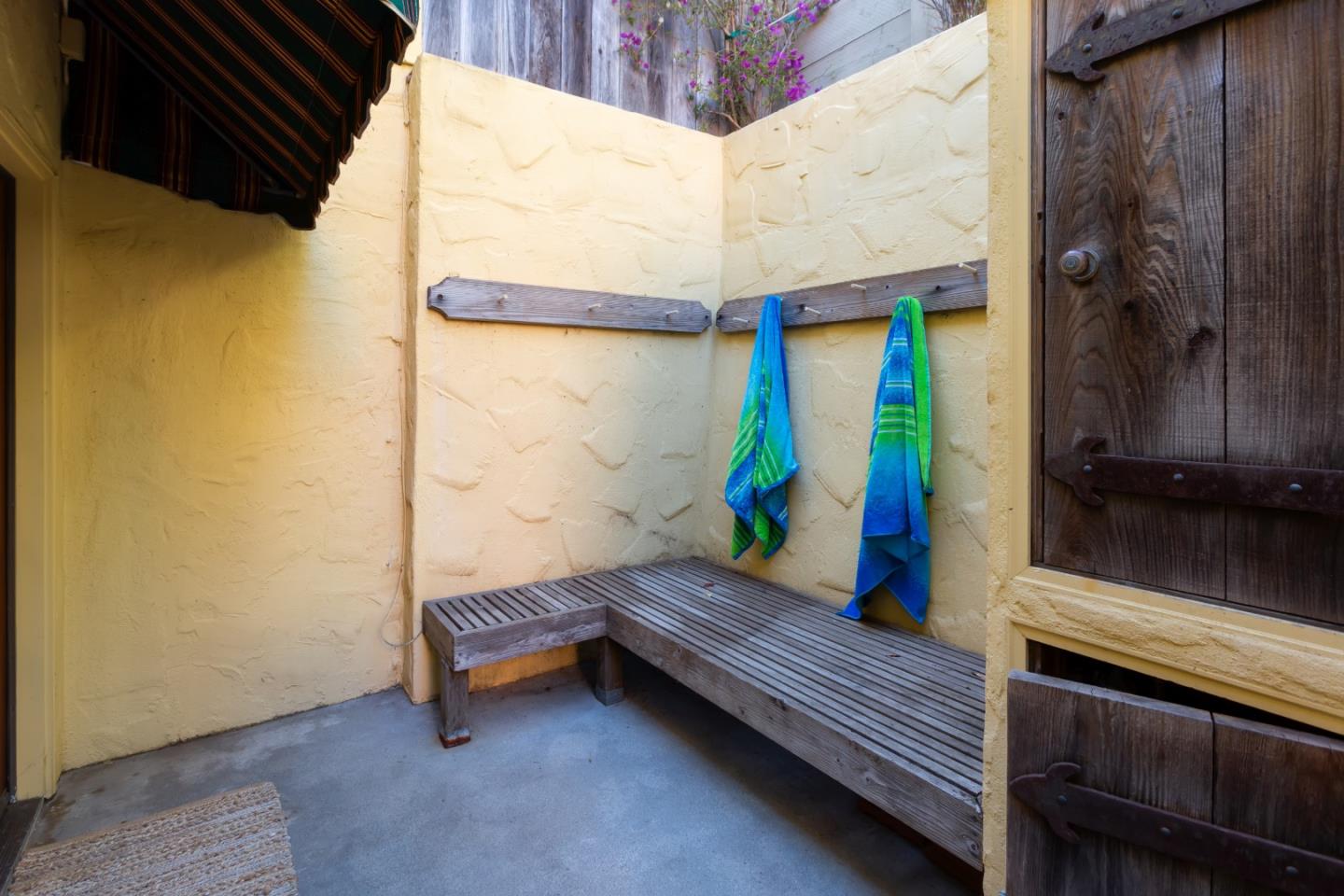 343 Beach Drive Aptos, CA 95003 - Photo 25 of 34 a backyard of a house with outdoor seating