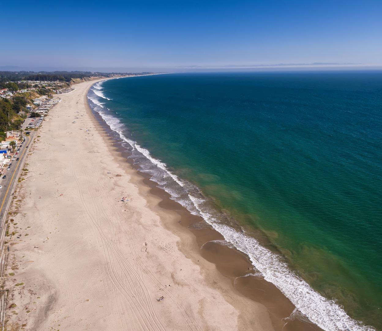 343 Beach Drive Aptos, CA 95003 - Photo 31 of 34 a view of a lake with a yard