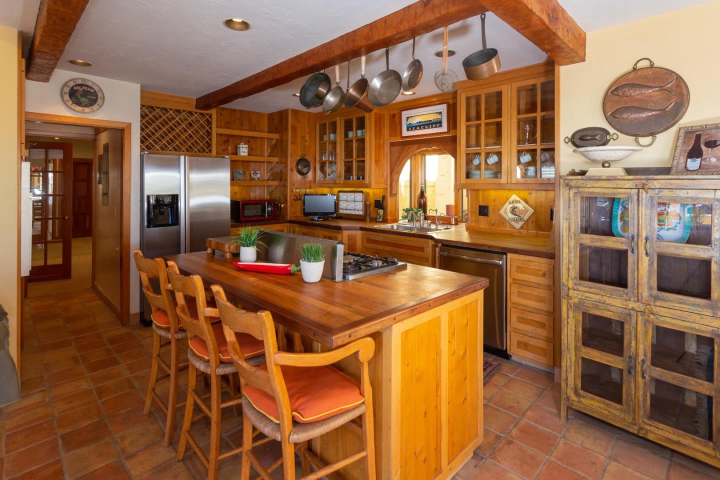 343 Beach Drive Aptos, CA 95003 - Photo 5 of 34 a kitchen with stainless steel appliances granite countertop a sink and cabinets