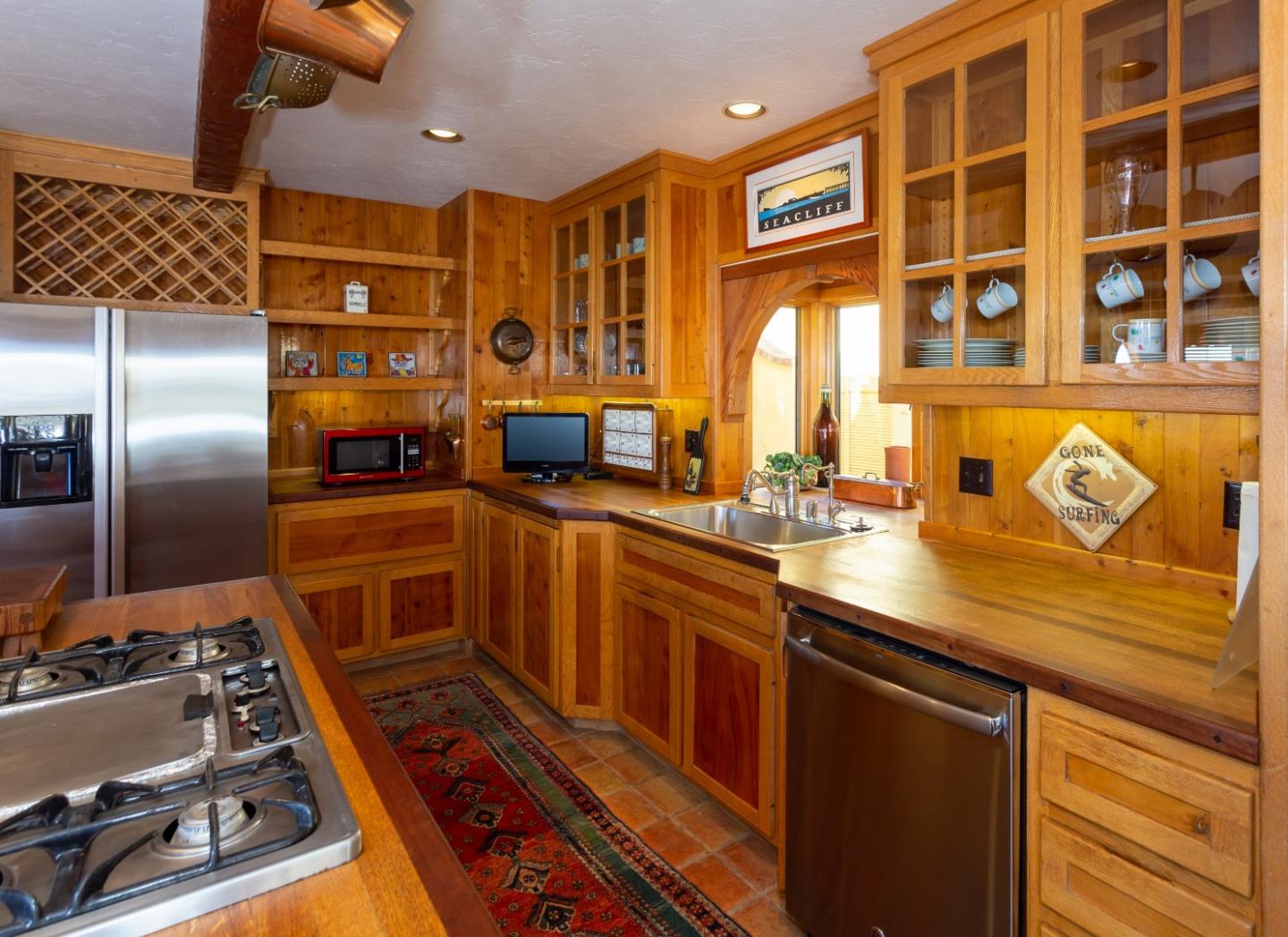 343 Beach Drive Aptos, CA 95003 - Photo 6 of 34 a kitchen with lots of counter top space and windows