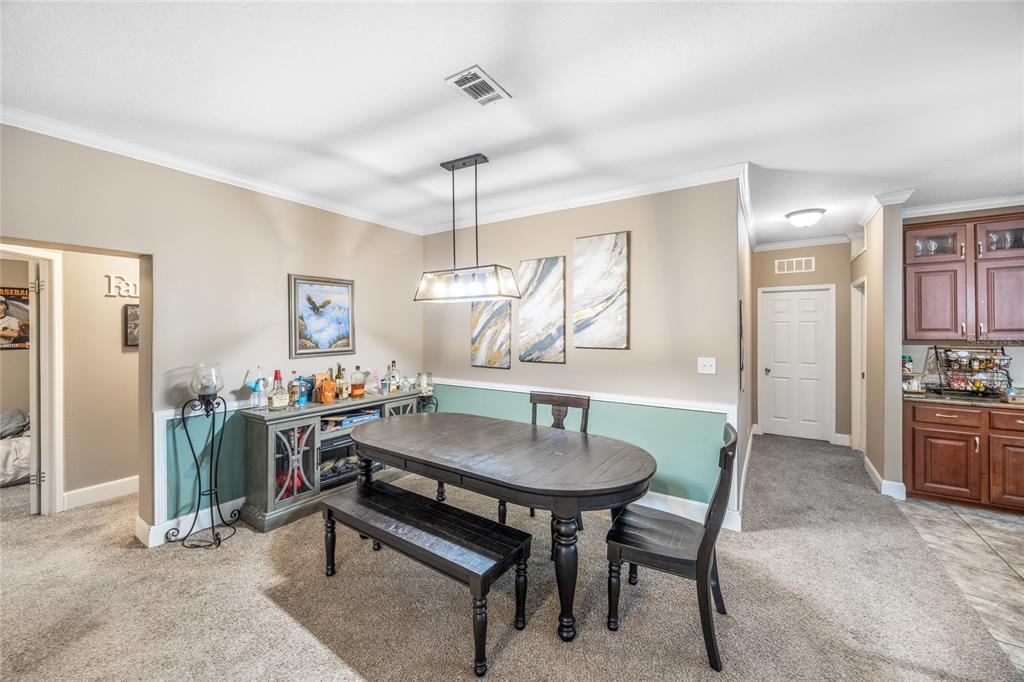 1085 State Rte 100 Florahome, FL 32140 - Photo 16 of 52 a view of a dining room with furniture