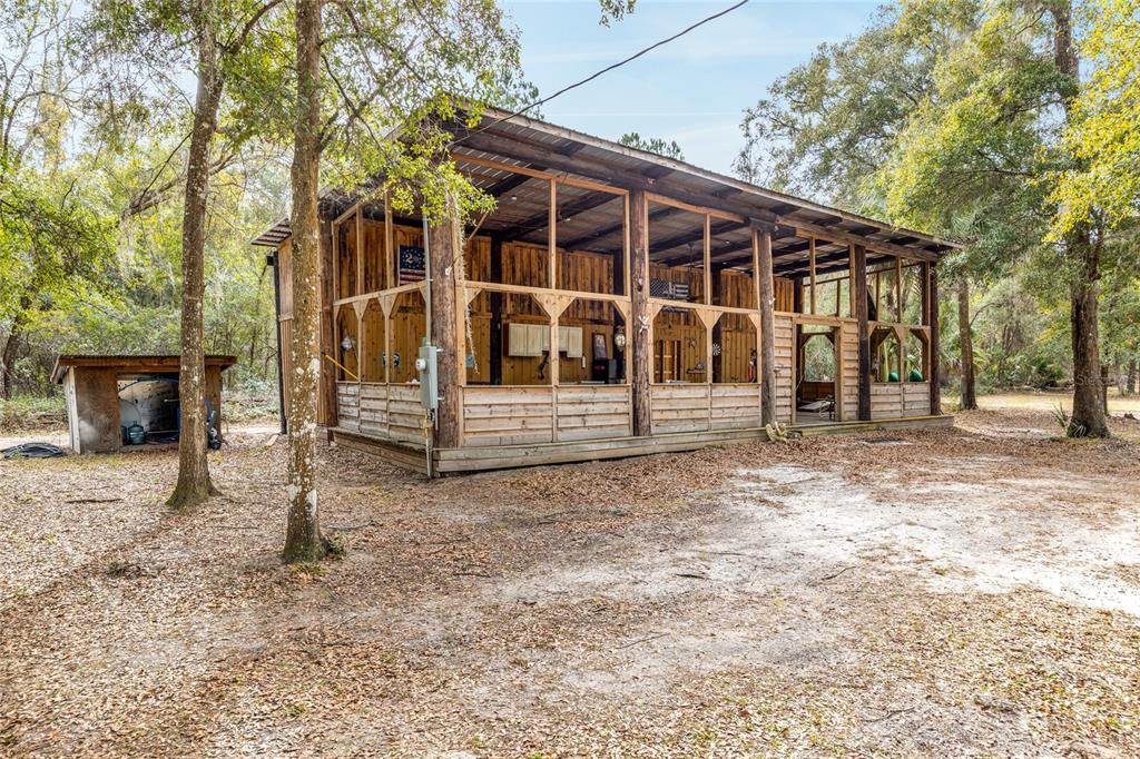 1085 State Rte 100 Florahome, FL 32140 - Photo 43 of 52 a view of a house with a yard
