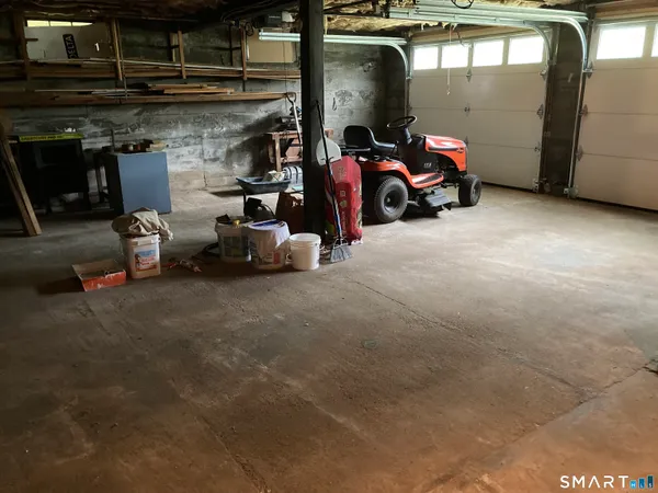a view of a garage with parked cars