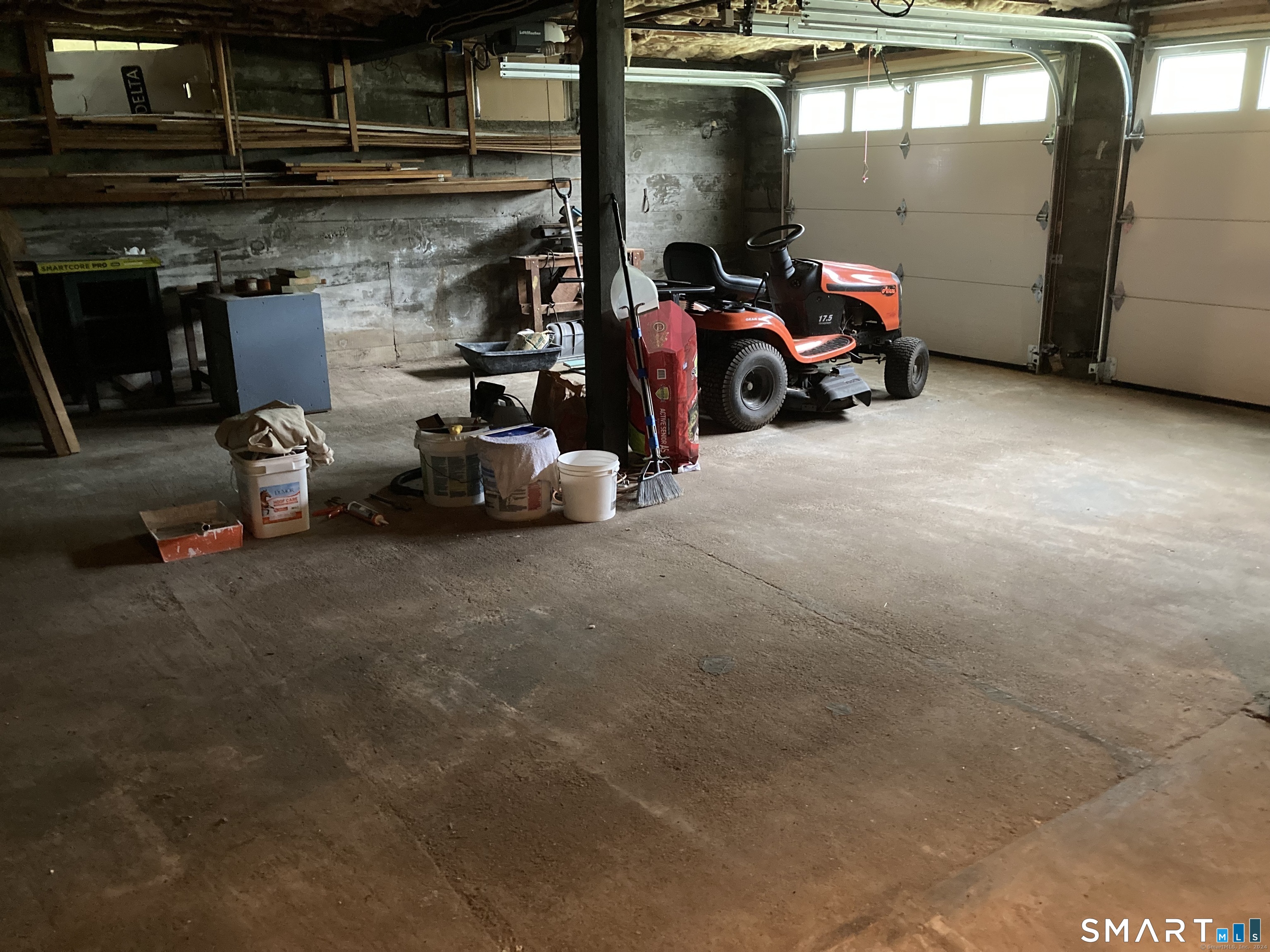 282 Norwich-Westerly Road Preston, CT 06365 - Photo 7 of 11 a view of a garage with parked cars