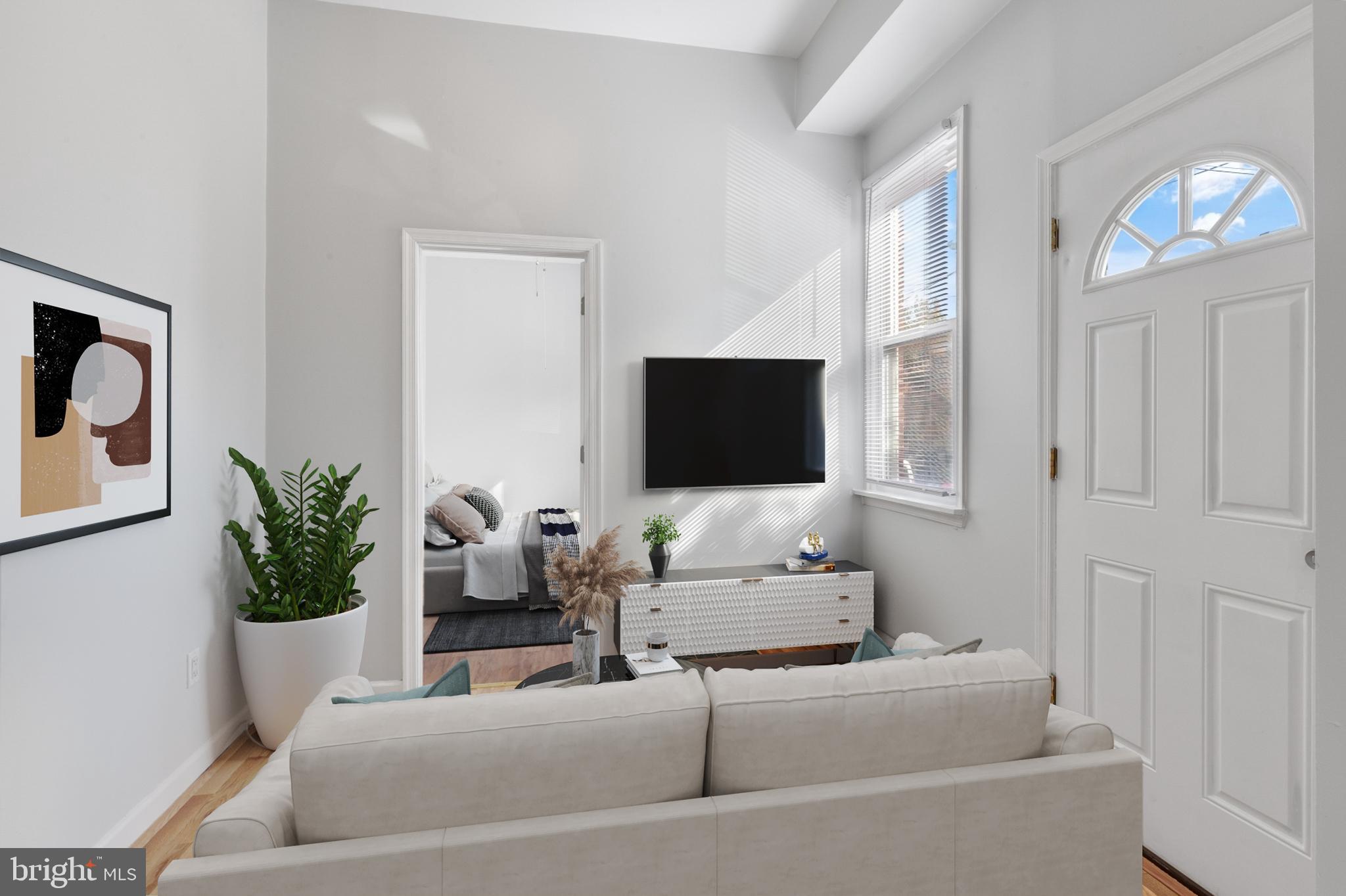 2641 East Madison Street Philadelphia, PA 19134 - Photo 5 of 17 1st Floor Unit: Living Room Virtually Staged