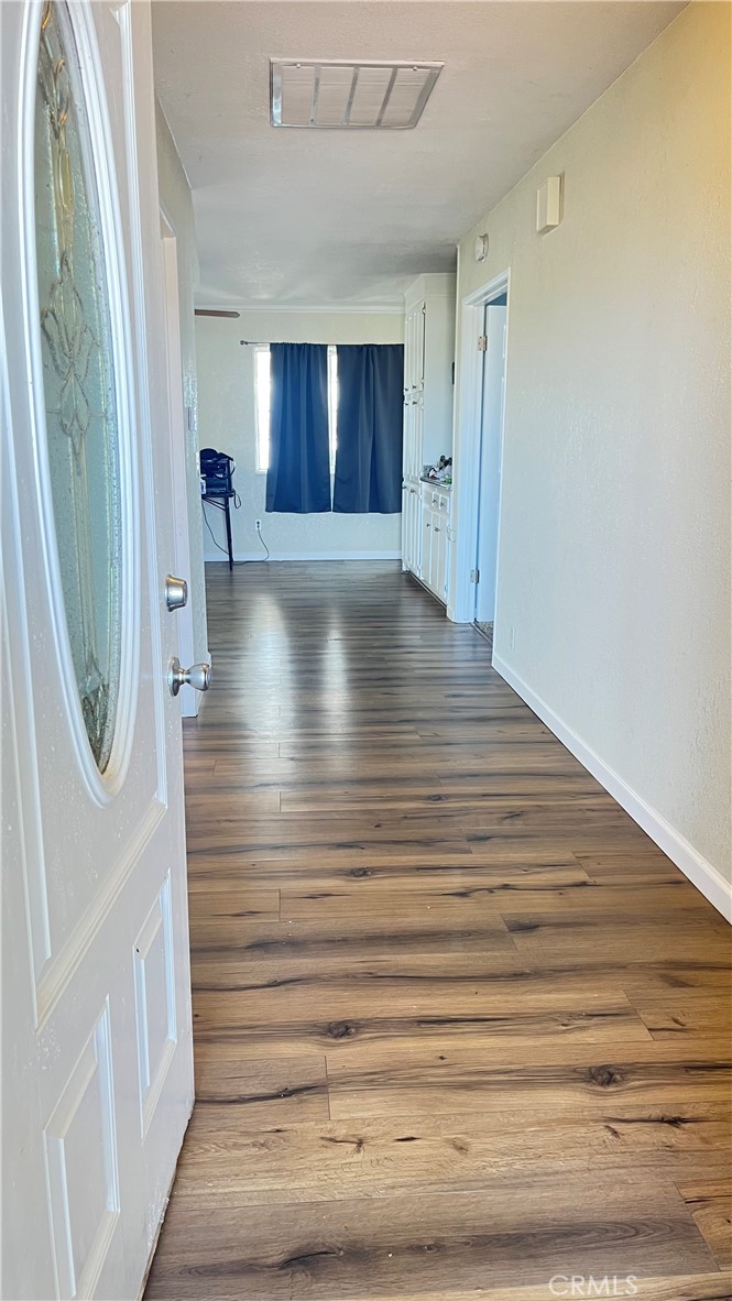 14515 Rivers Edge Road Helendale, CA 92342 - Photo 21 of 24 a view of an entryway with wooden floor
